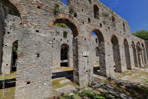 Round arches made of brickwork, south wall of the central aisle of the great basilica, Butrint archaeological site. Sarande-Albania-155 photo