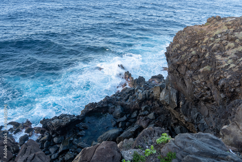 waves crashing on rocks waves crashing on rocks