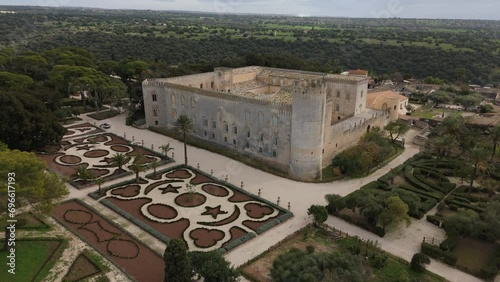 flying towards turret of historic Donnafugata Castle in Sicily photo