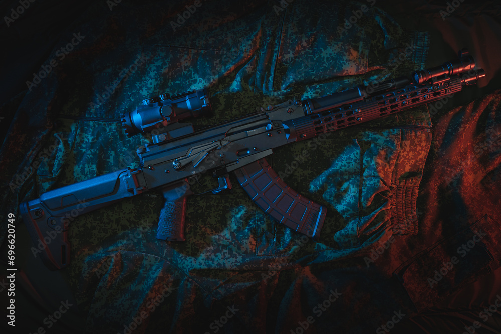 The old Soviet AKM has been converted into a modern tactical weapon. - obrazy, fototapety, plakaty 