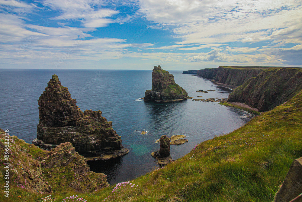 Seaside Serenity: Discover John o' Groats, Highland's Natural Beauty, NC500 north coast route in Scotland. landscape of duncansby stacks