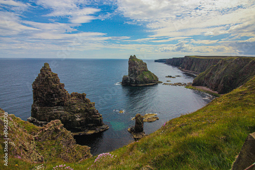 Seaside Serenity: Discover John o' Groats, Highland's Natural Beauty, NC500 north coast route in Scotland. landscape of duncansby stacks