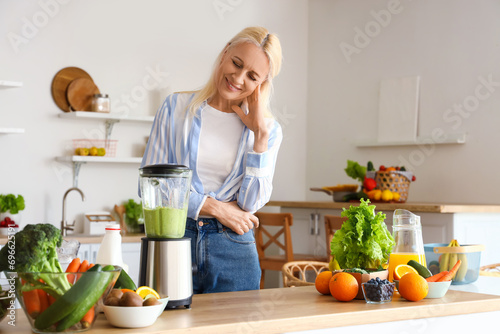 Mature woman making healthy...