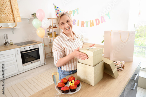 Mature woman with birthday ...