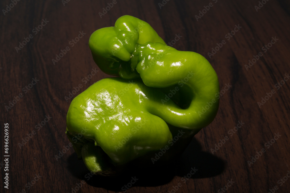 Green bell pepper (also known as sweet pepper, or capsicum) is the