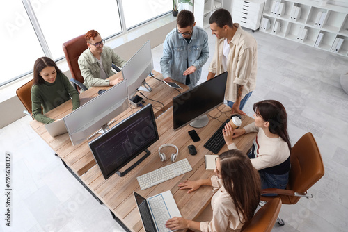 Team of young programmers w...