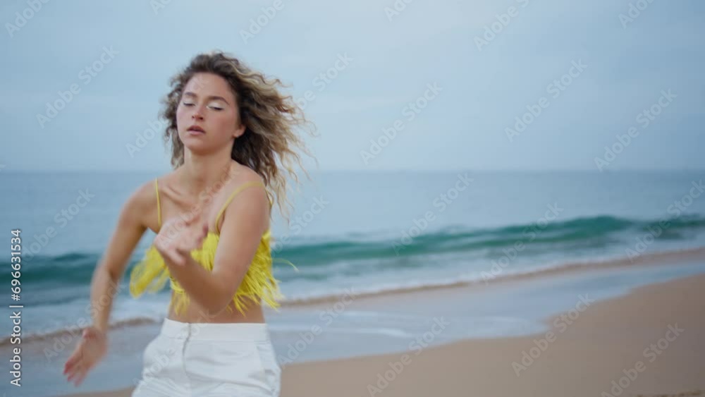 Choreographer performing dance beach moving flexible body. Curly dancer woman Choreographer performing dance beach moving flexible body. Curly dancer woman