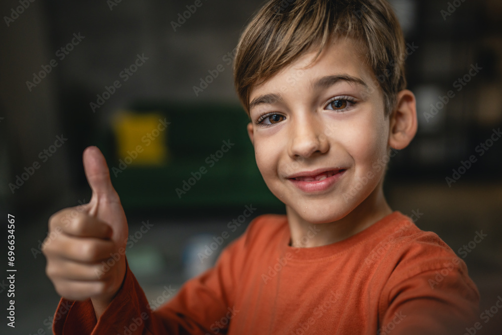 One boy caucasian child seven years old kid at home schoolboy portrait - obrazy, fototapety, plakaty 