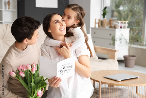 Young woman with greeting c...