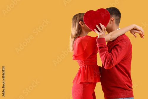Young couple in love hiding...