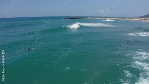 Drone flight over surfers in Aoshima Miyazaki