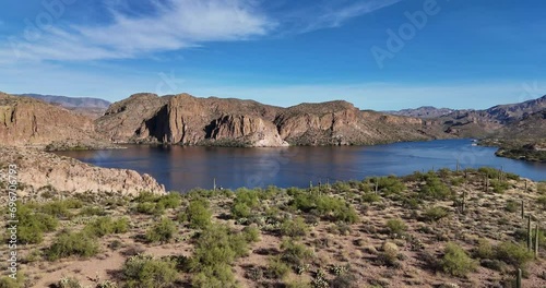 Aerial View of Lake with Mountains, Canyon Lake on the Apache Trail in Arizona, drone slowly moving forward photo