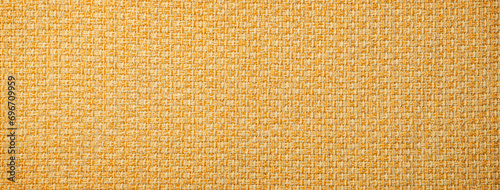 質感のある黄色い布地の背景テクスチャー