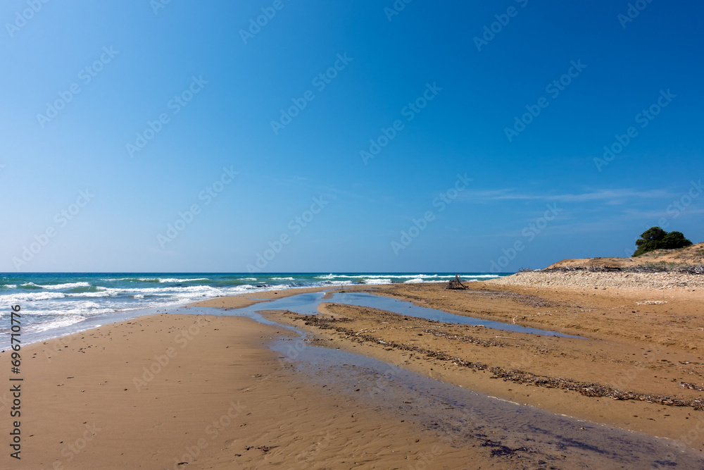 The gorgeous sandy beach of Issos in Corfu island, Greece