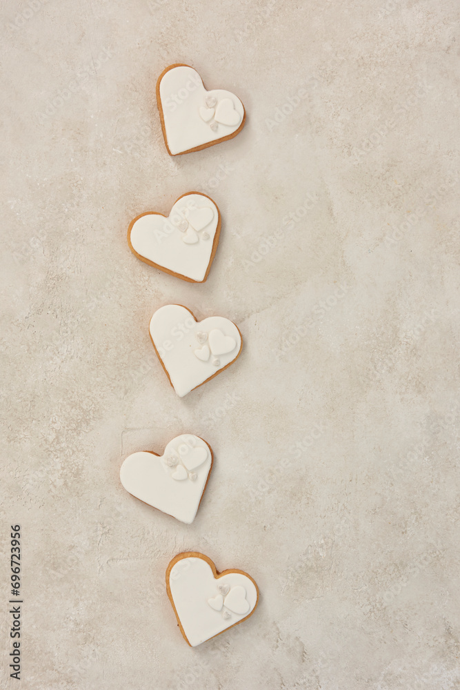 Fototapeta premium Heart cookies engagement wedding organization on the table style up view.