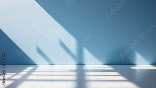 Empty room with blue walls, wooden floor and light shadow from the window, seen from the front. Modern minimalist background for product presentation or display 