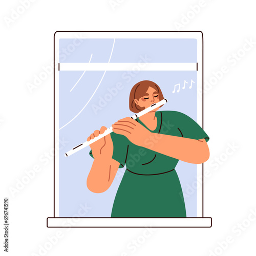 Woman musician playing flute, music instrument at home. Talented girl player ...