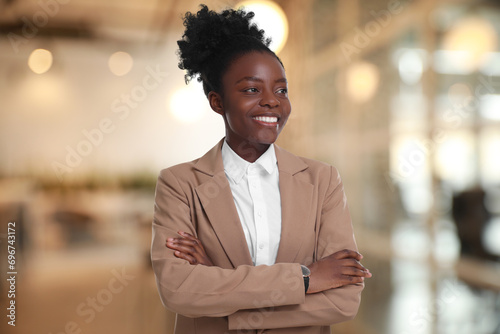Lawyer, consultant, business owner. Confident woman smiling indoors