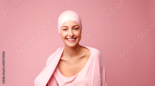 Wallpaper Mural A confident young bald woman in a pink headscarf is fighting, personifying women's health and the fight against breast cancer. Pink studio background with space for text. Torontodigital.ca