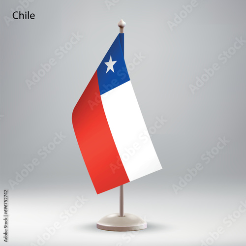 Flag of Chile hanging on a flag stand.