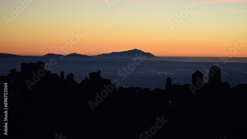 Ischia  Italian island at sunset with foreground on the medieval village of the old Caserta