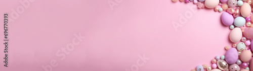 Easter holiday celebration, edge with pastell pink colored easter eggs on pastell pink background banner, with space for text and design