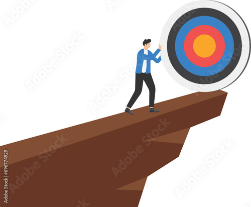 Missed target, failure or obstacle, difficulty in work that is hard to achieve target or set too high or unrealistic goal concept, businessman trying hard to push target up the hill.

