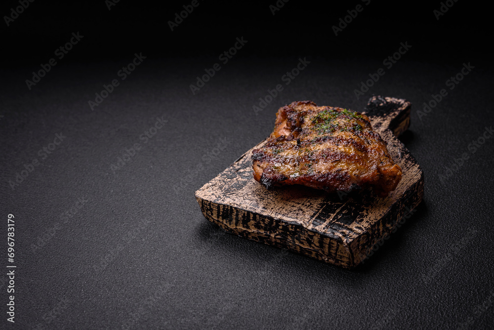 Delicious juicy beef or chicken steak with salt, spices and herbs Delicious juicy beef or chicken steak with salt, spices and herbs