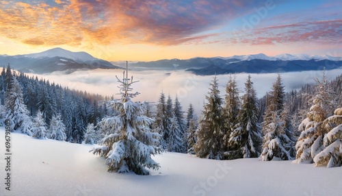 christmas postcard panoramic winter view of carpathian mountains with snow covered fir trees foggy sunrise on the mountain valley happy new year celebration concept