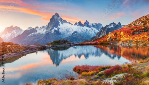 superb autumn sunrise on cheserys lake with mount blank on background spectacular outdoor scene of vallon de berard nature preserve chamonix location alps france europe photo