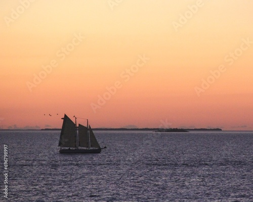 Sailing ship on a Caribbean ocean at sunset