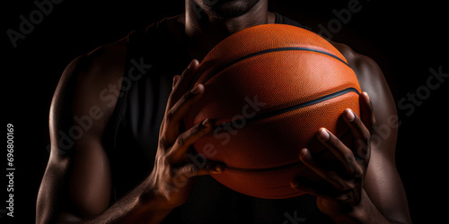 Closeup of basketball player holding ball