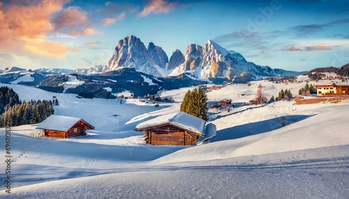 christmas postcard bright winter view of alpe di siusi village with plattkofel peak on background incredible morning scene of dolomite alps spectacular winter landscape of ityaly europe photo