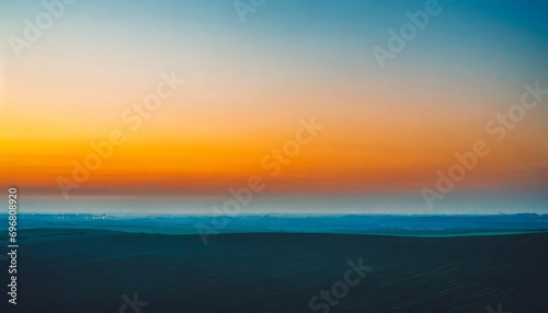 minimalistic sunset landscape orange sky and blue ground