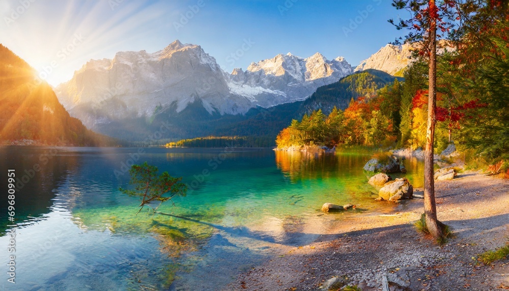 impressive summer sunrise on eibsee lake with zugspitze mountain range sunny outdoor scene in german alps bavaria germany europe beauty of nature concept background - obrazy, fototapety, plakaty 
