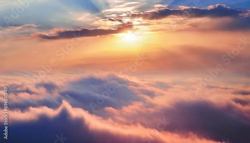 light soft panorama sunset sky background with pink clouds sunset over the clouds sky and clouds pink clouds in the sky clouds and sun rays © Florence