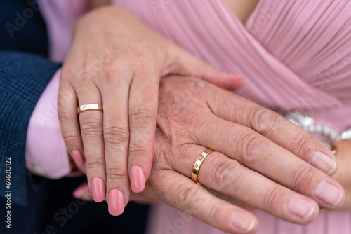 Details of the hands of the bride and groom with rings in a beautiful wedding, marriage ceremony