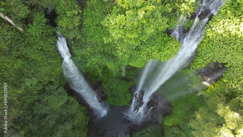 Aerial shot of Sekumpul waterfall located in Lemukih, Buleleng, Bali, Indonesia photo