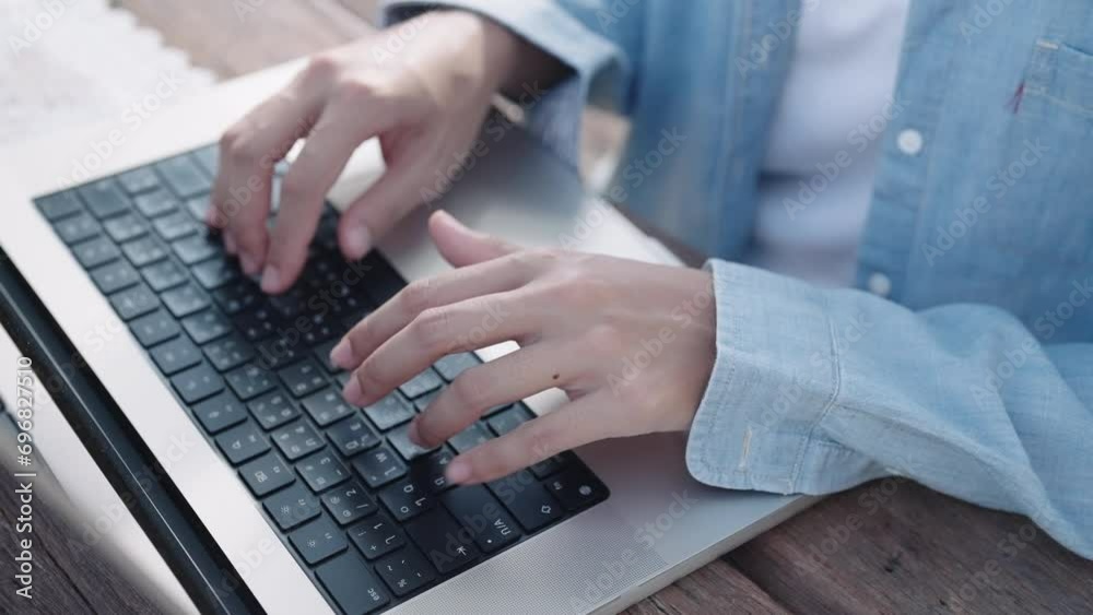 Close up shot of female professional user worker using typing on laptop notebook keyboard sit at home office desk working online Close up shot of female professional user worker using typing on laptop notebook keyboard sit at home office desk working online