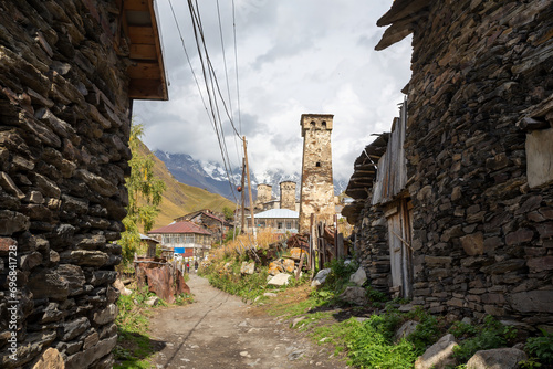 street in a historical village in the Ushguli mountains photo