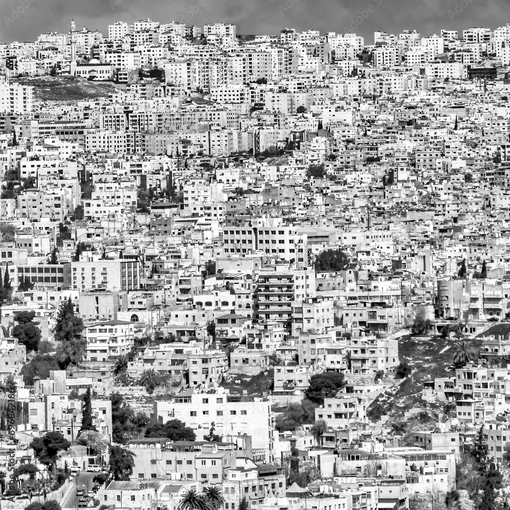 Black and white section of a view of Amman, the ugly overcrowded capital of Jordan