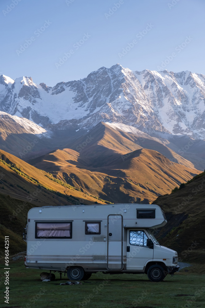 Motor home in the mountains at dawn