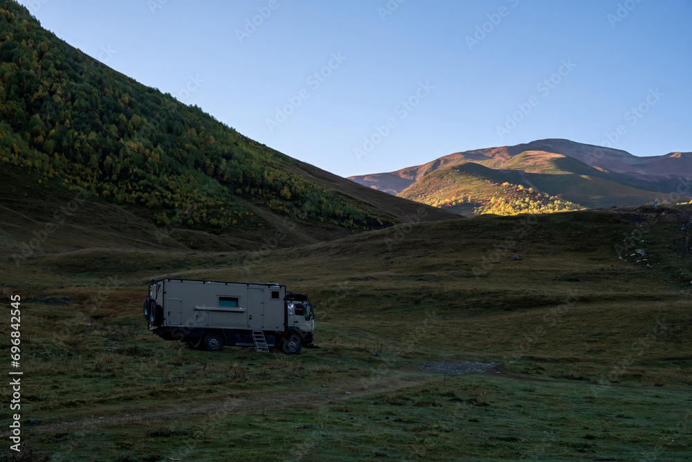 Motor home in the mountains at dawn