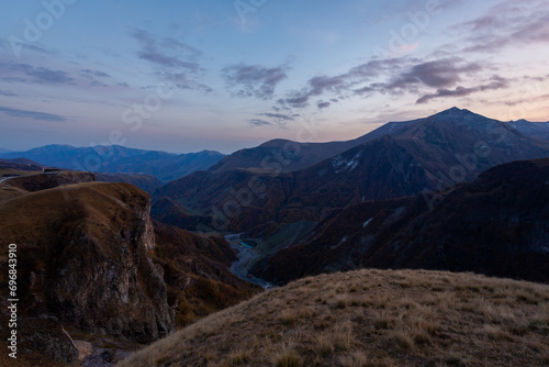 Caucasus mountains after sunset, dramatic landscape