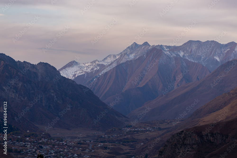 Caucasus mountains at sunset, dramatic landscape