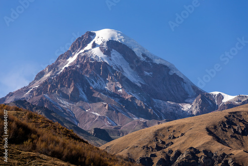 view of Mount Kazbek in the Caucasus mountains © vadimborkin