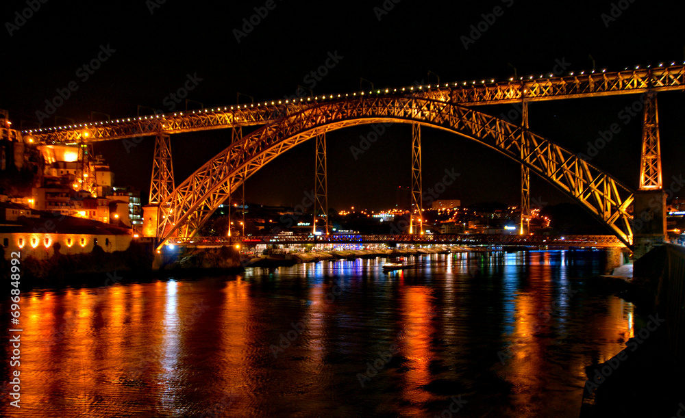 Luis I Bridge illuminated at night in Porto, Portugal