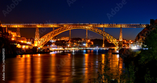 Luis I Bridge illuminated at night in Porto, Portugal photo
