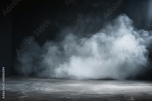 Studio with smoke weave mysterious dance against dark backdrop. Interplay of black and white creates atmospheric effect enhancing sense of mystery and drama