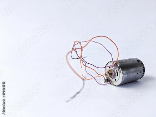 Canvas Print Motor dynamo with random strings on a white background